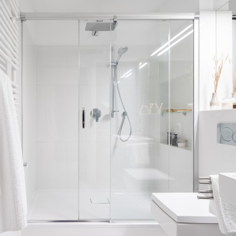 Walk-in Shower with Metallic Accents